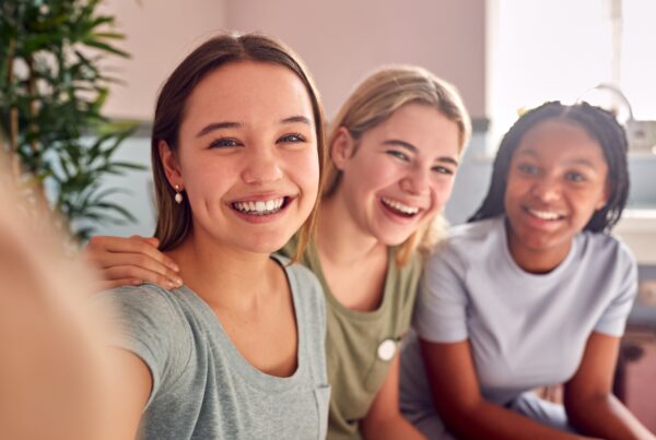 Group of smiling teen girls